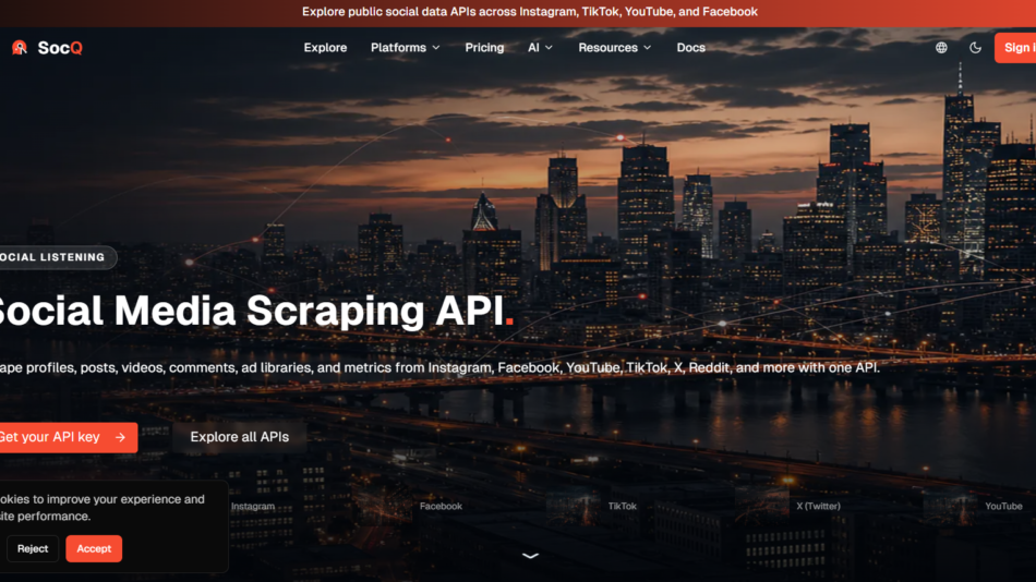 Nighttime city skyline hero with illuminated skyscrapers; overlaid headline 'Social Media Scraping API' and description about scraping profiles across platforms.