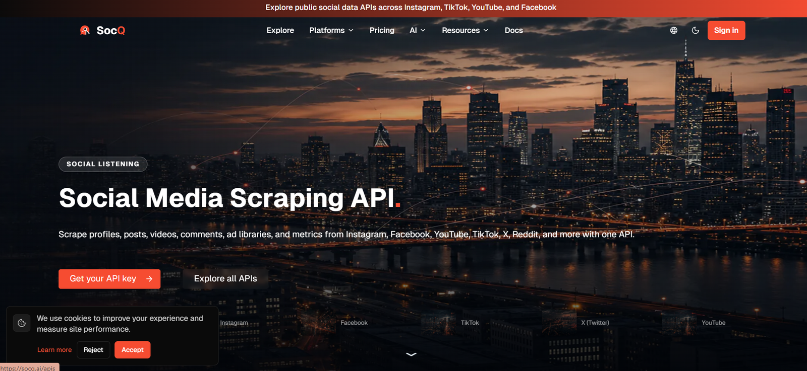 29 - Nighttime city skyline hero with illuminated skyscrapers; overlaid headline 'Social Media Scraping API' and description about scraping profiles across platforms.
