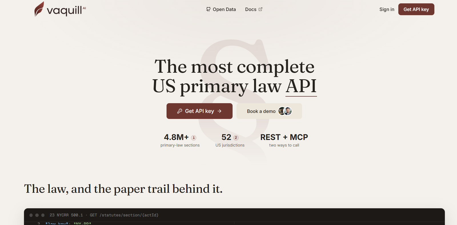 22 - Hero section for Vaquill AI: headline reads 'The most complete US primary law API' with brown 'Get API key' and beige 'Book a demo' buttons on a light cream background, logo top left.