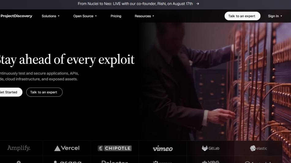 Hero banner with the headline 'Stay ahead of every exploit' and two CTAs on the left, plus a technician at a server rack on the right group of images in a dark themed hero section.