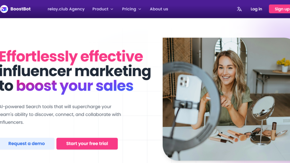 31 - Hero banner with bold pink and dark text: 'Effortlessly effective influencer marketing to boost your sales' and a smiling woman filming herself at a makeup vanity on the right.