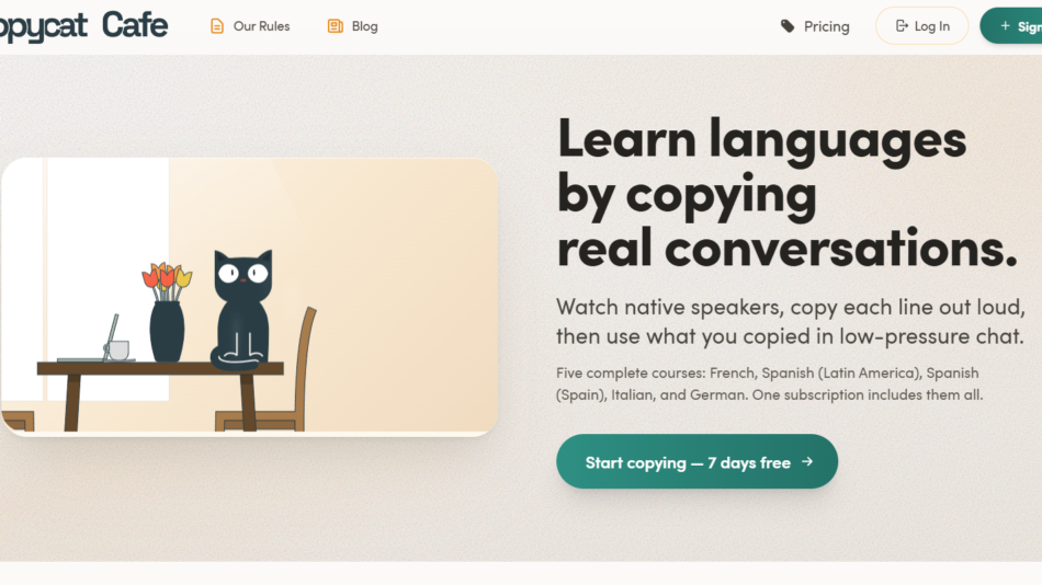 Hero illustration: a black cat sits on a desk with a vase of tulips and a laptop, beside the large 'Learn languages by copying real conversations' headline.