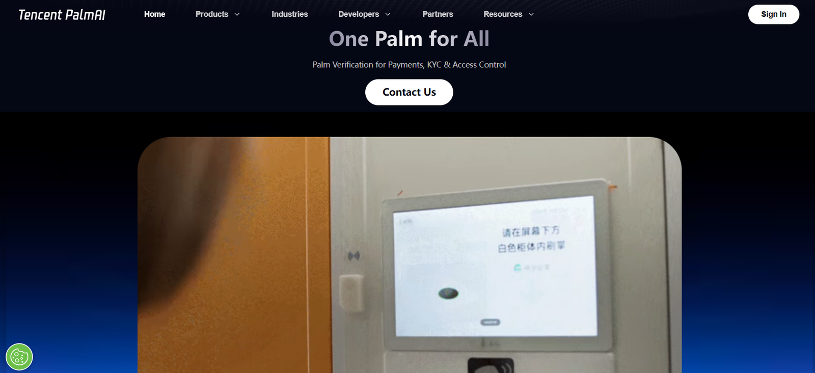 50 - Touchscreen payment terminal mounted on a wall, displaying Chinese text on the screen alongside a card reader below.